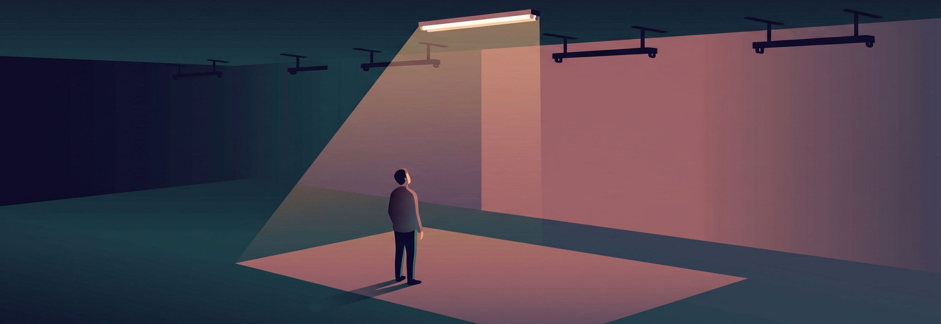 Lone figure in empty concrete car park beneath one lit strip light; three identical dark fixtures missing from the row